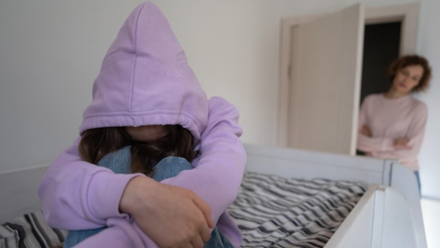 An anxious mother worried about her withdrawn teenage girl.