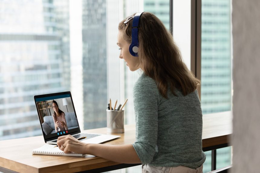 A girl receiving help from a low-cost online tutor.