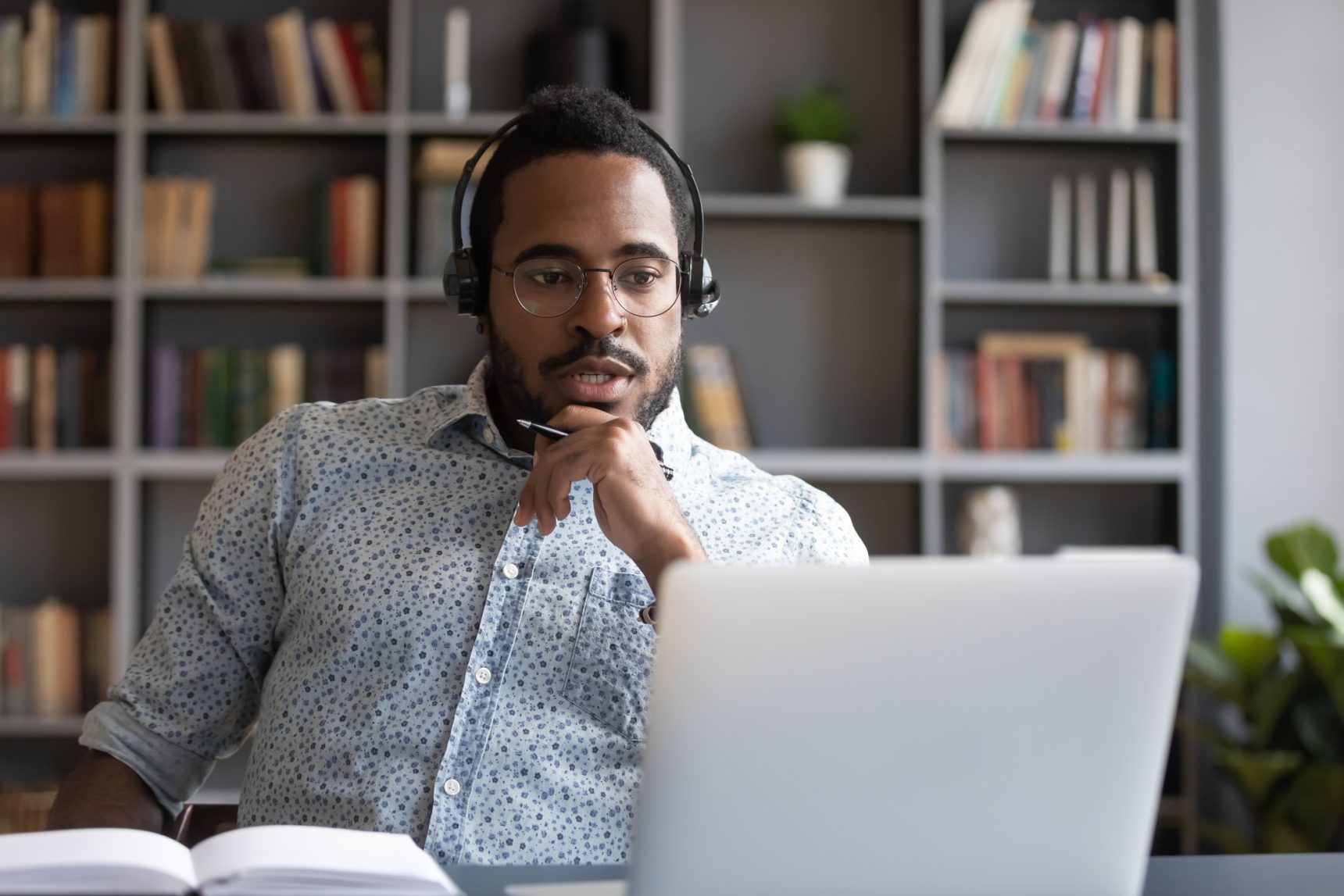 Male online tutor. To prevent burnout, it is important to set boundaries with your students.