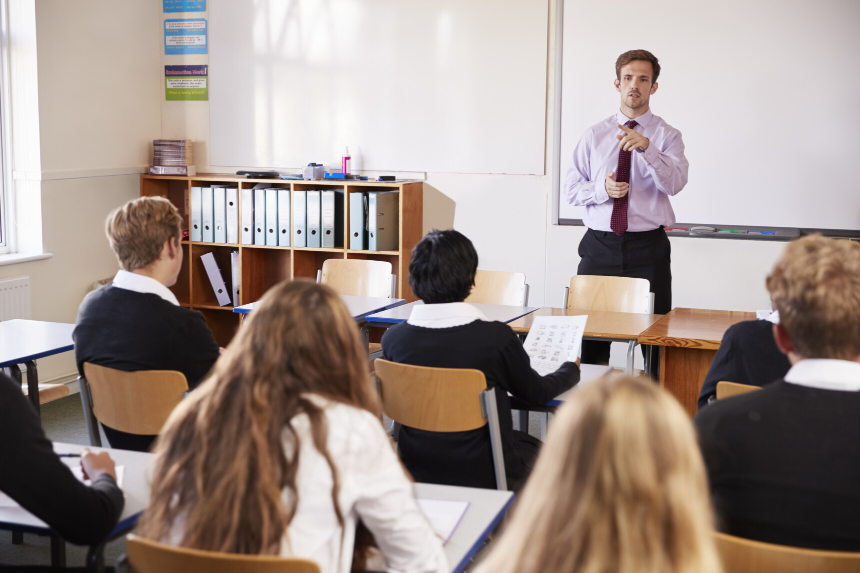A teacher is using cold calling as a formative assessment method to check student understanding during a lesson.