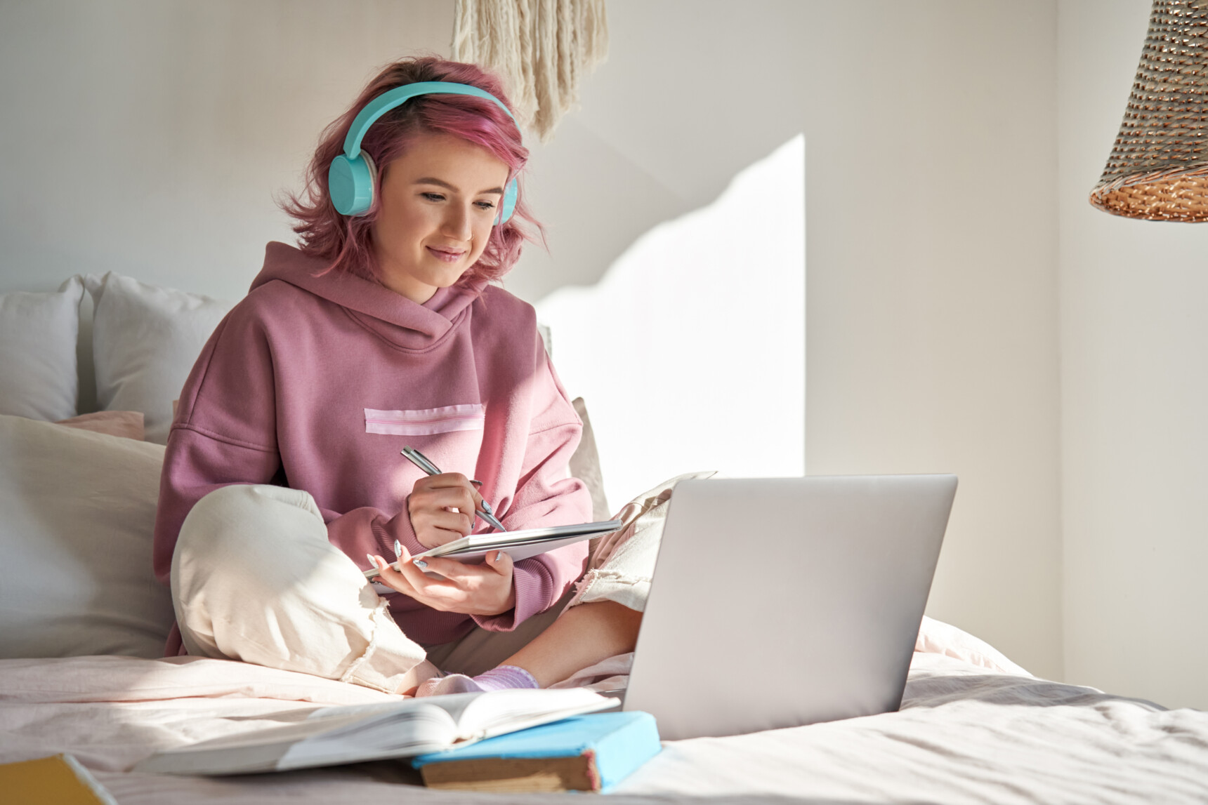 A female home educated student is participating in an online course.
